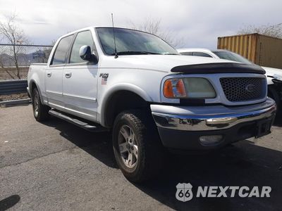 Czwarte zdjęcie samochodu z boku: 2002 FORD F150 SUPERCREW VIN:1FTRW08L02KE04346 - miniatura