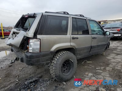 Trzecie zdjęcie samochodu z tyłu: 1997 JEEP GRAND CHEROKEE LAREDO VIN:1J4GZ58S1VC732970 - miniatura