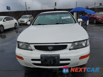 Piąte zdjęcie samochodu w środku: 1995 NISSAN MAXIMA GLE VIN:JN1CA21D8ST662596 - miniatura