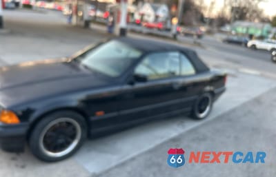 Drugie zdjęcie samochodu z przodu: 1999 BMW 323 IC VIN:WBABJ7333XEA18932 - miniatura