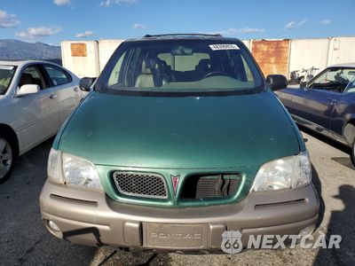 Piąte zdjęcie samochodu w środku: 2000 PONTIAC MONTANA VIN:1GMDX03EXYD186277 - miniatura