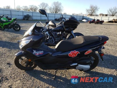 Trzecie zdjęcie samochodu z tyłu: 2018 HONDA PCX 150 VIN:RLHKF1807JY301837 - miniatura
