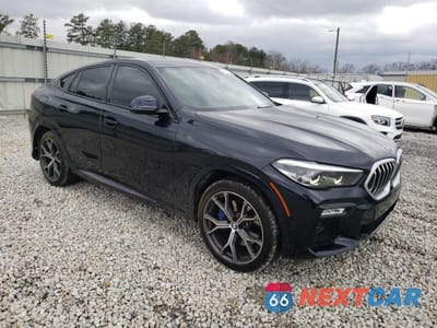 Czwarte zdjęcie samochodu z boku: 2021 BMW X6 SDRIVE 40I VIN:5UXCY4C05M9F01879 - miniatura