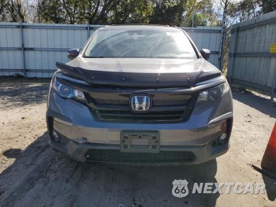 Piąte zdjęcie samochodu w środku: 2021 HONDA PILOT SE VIN:5FNYF5H29MB038497 - miniatura