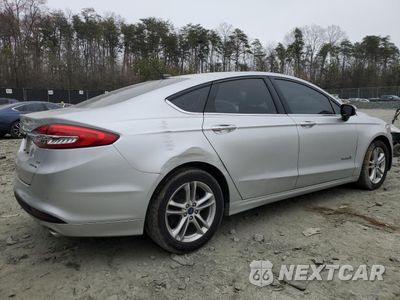 Trzecie zdjęcie samochodu z tyłu: 2018 FORD FUSION SE HYBRID VIN:3FA6P0LU6JR164493 - miniatura