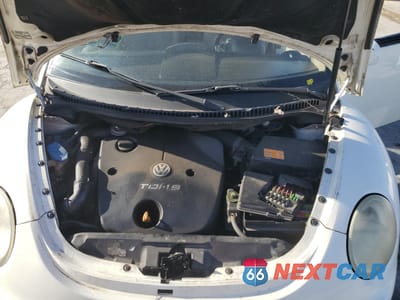 Zdjęcie 13 z 14 samochodu: 2003 VOLKSWAGEN NEW BEETLE GL TDI VIN:3VWBP21C03M422129 - miniatura