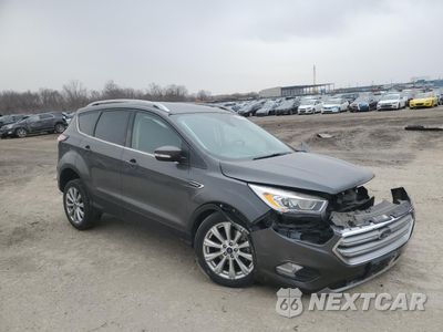 Czwarte zdjęcie samochodu z boku: 2017 FORD ESCAPE TITANIUM VIN:1FMCU9JD7HUE46427 - miniatura