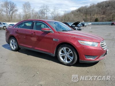 Czwarte zdjęcie samochodu z boku: 2014 FORD TAURUS SEL VIN:1FAHP2E89EG121218 - miniatura