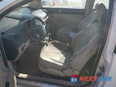 Zdjęcie 7 z 14 samochodu: 2003 VOLKSWAGEN NEW BEETLE GL TDI VIN:3VWBP21C03M422129 - miniatura