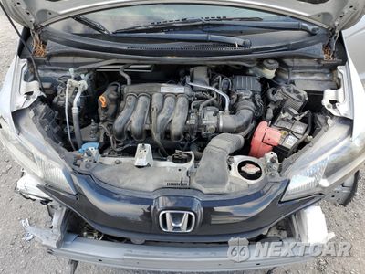Zdjęcie 12 z 14 samochodu: 2016 HONDA FIT LX VIN:JHMGK5H58GX011625 - miniatura