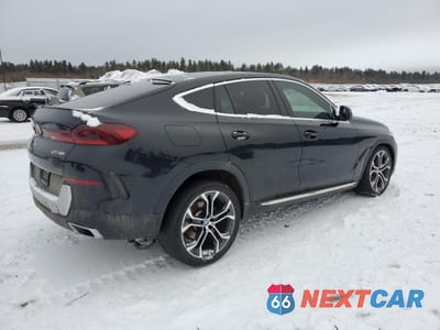 Trzecie zdjęcie samochodu z tyłu: 2021 BMW X6 SDRIVE 40I VIN:5UXCY4C03M9H58300 - miniatura