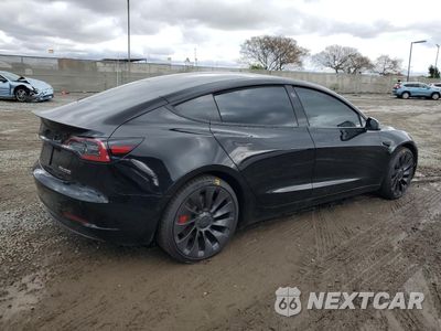 Trzecie zdjęcie samochodu z tyłu: 2021 TESLA MODEL 3 VIN:5YJ3E1EC0MF075439 - miniatura