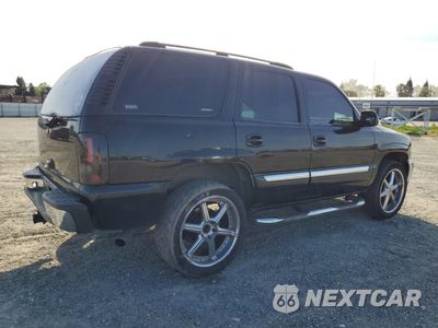 Trzecie zdjęcie samochodu z tyłu: 2003 GMC YUKON VIN:1GKEC13V93R271587 - miniatura