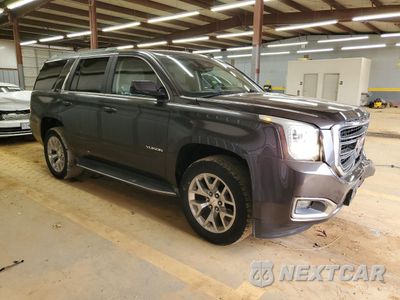 Czwarte zdjęcie samochodu z boku: 2015 GMC YUKON SLE VIN:1GKS1AKCXFR269862 - miniatura