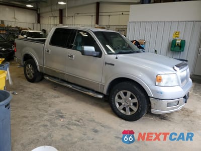 Czwarte zdjęcie samochodu z boku: 2006 LINCOLN MARK LT VIN:5LTPW16536FJ05009 - miniatura