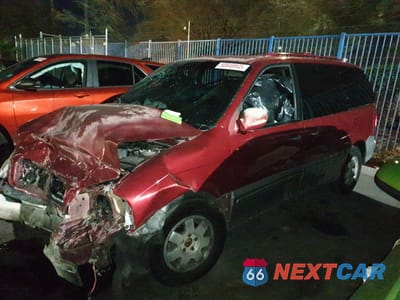 2003 KIA SEDONA EX KNDUP131136420326 - główne zdjęcie licytacji z USA - miniatura