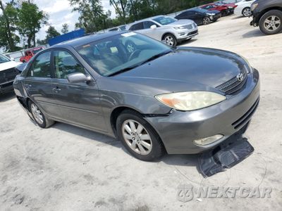 Czwarte zdjęcie samochodu z boku: 2004 TOYOTA CAMRY LE VIN:4T1BE32K34U801624 - miniatura