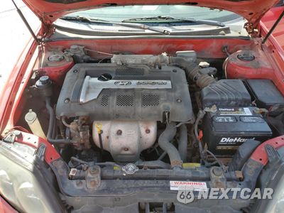 Zdjęcie 12 z 14 samochodu: 2004 HYUNDAI TIBURON VIN:KMHHM65D14U105288 - miniatura