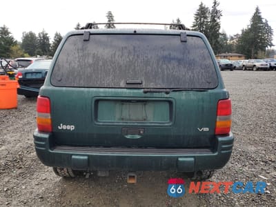 Zdjęcie 6 z 12 samochodu: 1998 JEEP GRAND CHEROKEE LAREDO VIN:1J4GZ48Y3WC360354 - miniatura