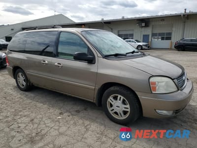 Czwarte zdjęcie samochodu z boku: 2005 FORD FREESTAR SEL VIN:2FMZA52275BA75957 - miniatura