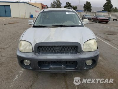 Piąte zdjęcie samochodu w środku: 2004 HYUNDAI SANTA FE GLS VIN:KM8SC13DX4U771225 - miniatura