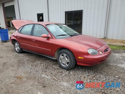 Czwarte zdjęcie samochodu z boku: 1999 FORD TAURUS SE VIN:1FAFP53U7XA201969 - miniatura