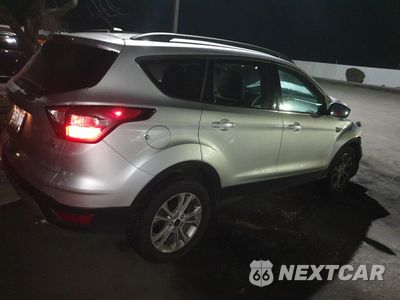 Trzecie zdjęcie samochodu z tyłu: 2017 FORD ESCAPE SE VIN:1FSCU9G90HUA39911 - miniatura