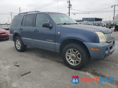 Czwarte zdjęcie samochodu z boku: 2002 MERCURY MOUNTAINEER VIN:4M2ZU66WX2ZJ39488 - miniatura