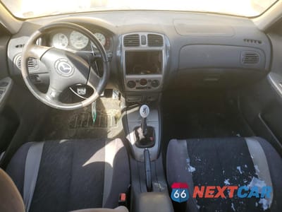 Zdjęcie 8 z 12 samochodu: 2001 MAZDA PROTEGE MP3 VIN:JM1BJ227X10466550 - miniatura