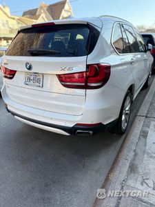 Czwarte zdjęcie samochodu z boku: 2016 BMW X5 XDR40E VIN:5UXKT0C51G0S76848 - miniatura