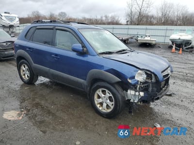 Czwarte zdjęcie samochodu z boku: 2009 HYUNDAI TUCSON SE VIN:KM8JN72D39U933682 - miniatura