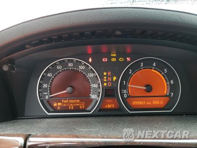 Zdjęcie 9 z 12 samochodu: 2006 BMW 760 LI VIN:WBAHN03556DD98321 - miniatura