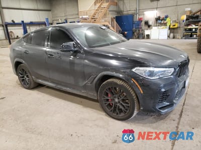 Czwarte zdjęcie samochodu z boku: 2022 BMW X6 M VIN:5YMCY0C01N9J70735 - miniatura