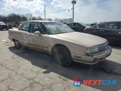 Czwarte zdjęcie samochodu z boku: 1992 OLDSMOBILE 88 ROYALE VIN:1G3CX5319N4339660 - miniatura