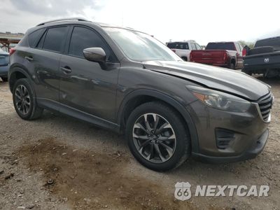Czwarte zdjęcie samochodu z boku: 2016 MAZDA CX-5 GT VIN:JM3KE2DY7G0735355 - miniatura