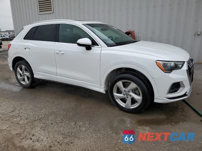 Czwarte zdjęcie samochodu z boku: 2020 AUDI Q3 PREMIUM VIN:WA1AECF30L1038250 - miniatura