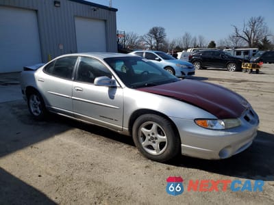Czwarte zdjęcie samochodu z boku: 2002 PONTIAC GRAND PRIX SE VIN:1G2WK52J22F115047 - miniatura