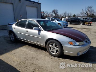 Czwarte zdjęcie samochodu z boku: 2002 PONTIAC GRAND PRIX SE VIN:1G2WK52J22F115047 - miniatura