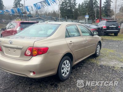 Czwarte zdjęcie samochodu z boku: 2009 TOYOTA COROLLA BASE VIN:1NXBU40E09Z096889 - miniatura