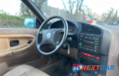 Piąte zdjęcie samochodu w środku: 1999 BMW 323 IC VIN:WBABJ7333XEA18932 - miniatura