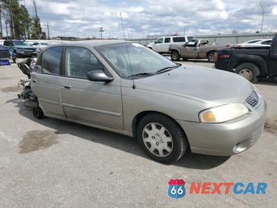 Czwarte zdjęcie samochodu z boku: 2000 NISSAN SENTRA BASE VIN:3N1CB51D4YL354434 - miniatura