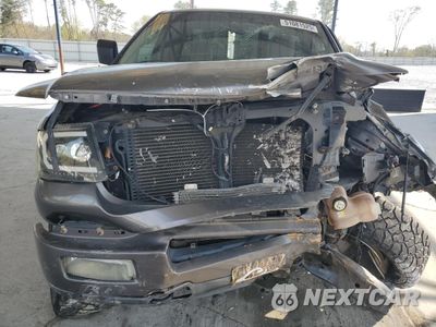 Zdjęcie 12 z 14 samochodu: 2004 FORD F150 VIN:1FTRF12W24NB49712 - miniatura