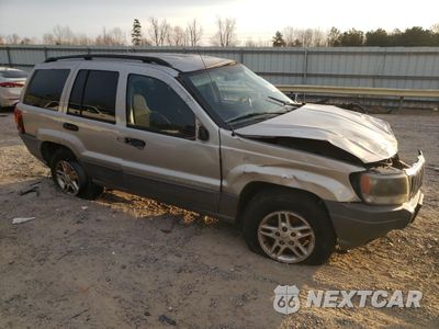 Czwarte zdjęcie samochodu z boku: 2003 JEEP GRAND CHEROKEE LAREDO VIN:1J4GX48S33C515336 - miniatura