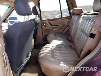 Zdjęcie 12 z 15 samochodu: 1999 JEEP GRAND CHEROKEE LIMITED VIN:1J4GW68S2XC655723 - miniatura