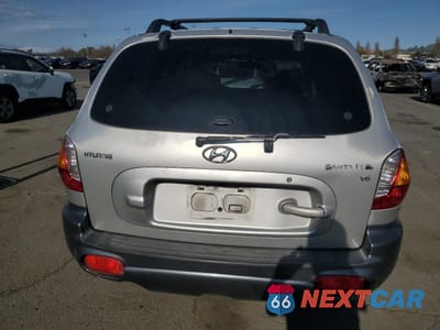 Zdjęcie 6 z 15 samochodu: 2002 HYUNDAI SANTA FE GLS VIN:KM8SC13D82U324289 - miniatura