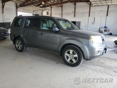 Czwarte zdjęcie samochodu z boku: 2009 HONDA PILOT EXL VIN:5FNYF48679B043640 - miniatura