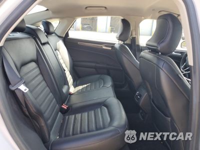 Zdjęcie 10 z 12 samochodu: 2017 FORD FUSION SE HYBRID VIN:3FA6P0LU7HR409117 - miniatura