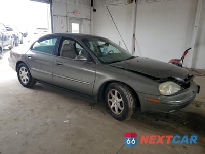 Czwarte zdjęcie samochodu z boku: 2003 MERCURY SABLE LS PREMIUM VIN:1MEHM55S43A604727 - miniatura