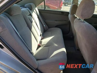 Zdjęcie 10 z 12 samochodu: 2002 TOYOTA CAMRY LE VIN:4T1BE32K12U635844 - miniatura