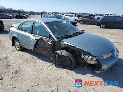 Czwarte zdjęcie samochodu z boku: 2001 SATURN SL1 VIN:1G8ZH54801Z330712 - miniatura